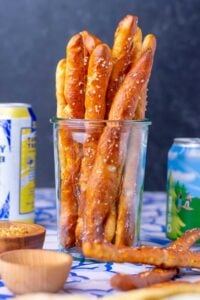 Jar of hard sourdough pretzel rods.