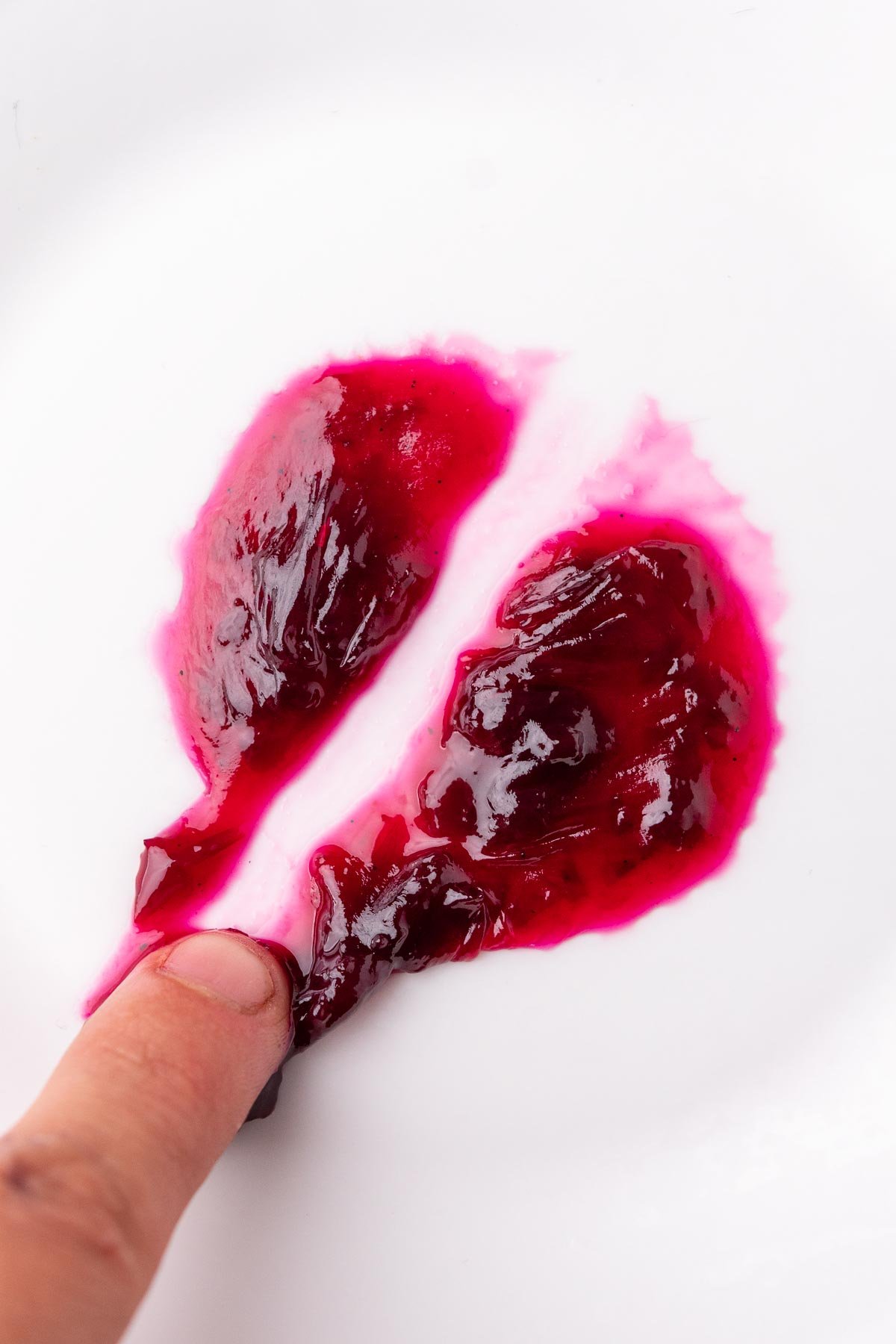 Jam passes the freezer plate test with clear and clean line through middle of jam with finger dragged through.