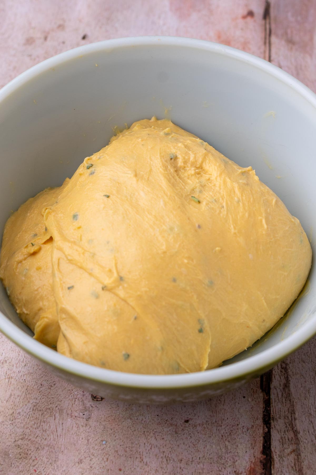 Sourdough sweet potato dinner roll dough at the start of bulk fermentation in bowl