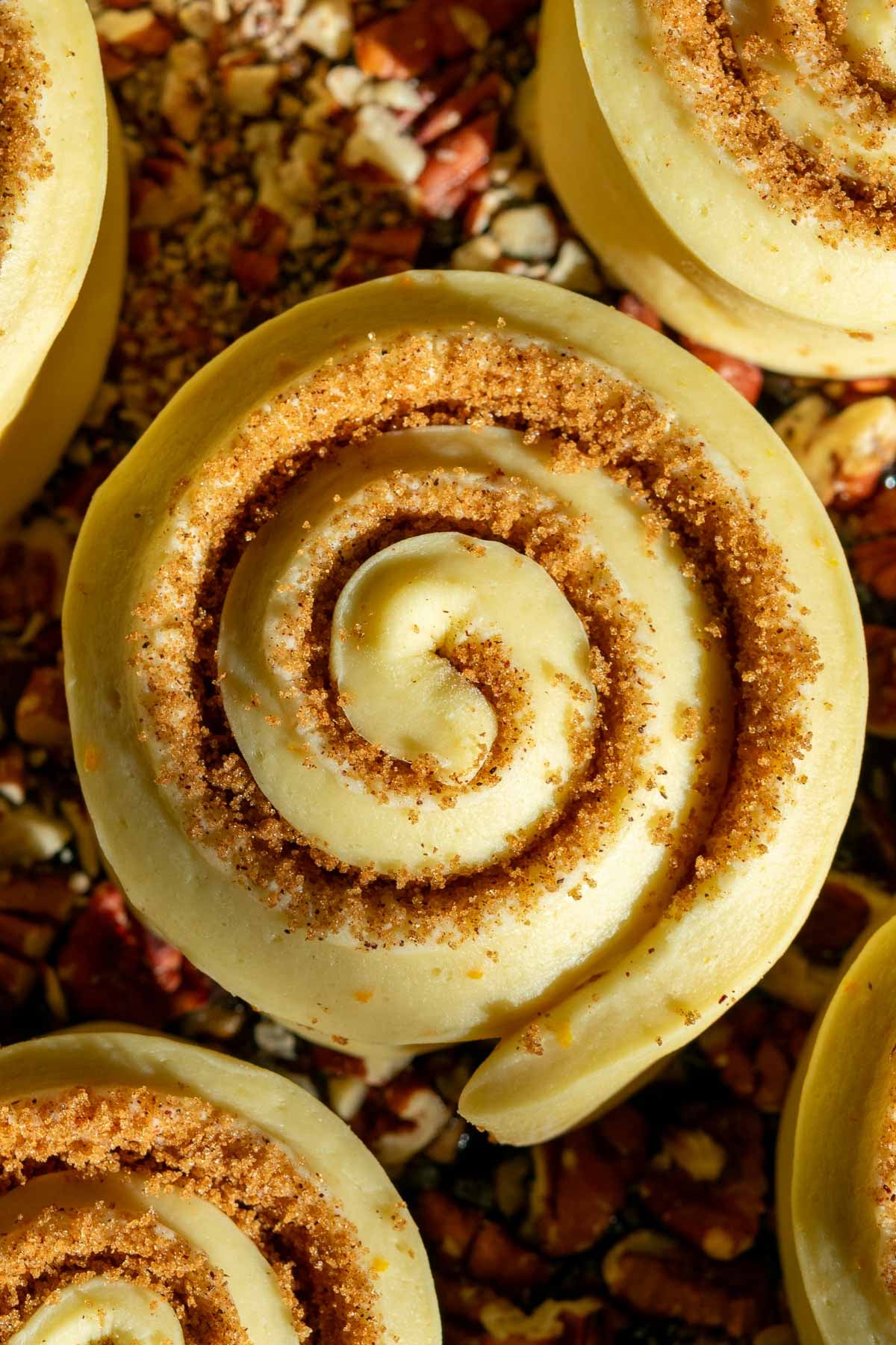 Close up of a sourdough sticky bun at the start of proofing.