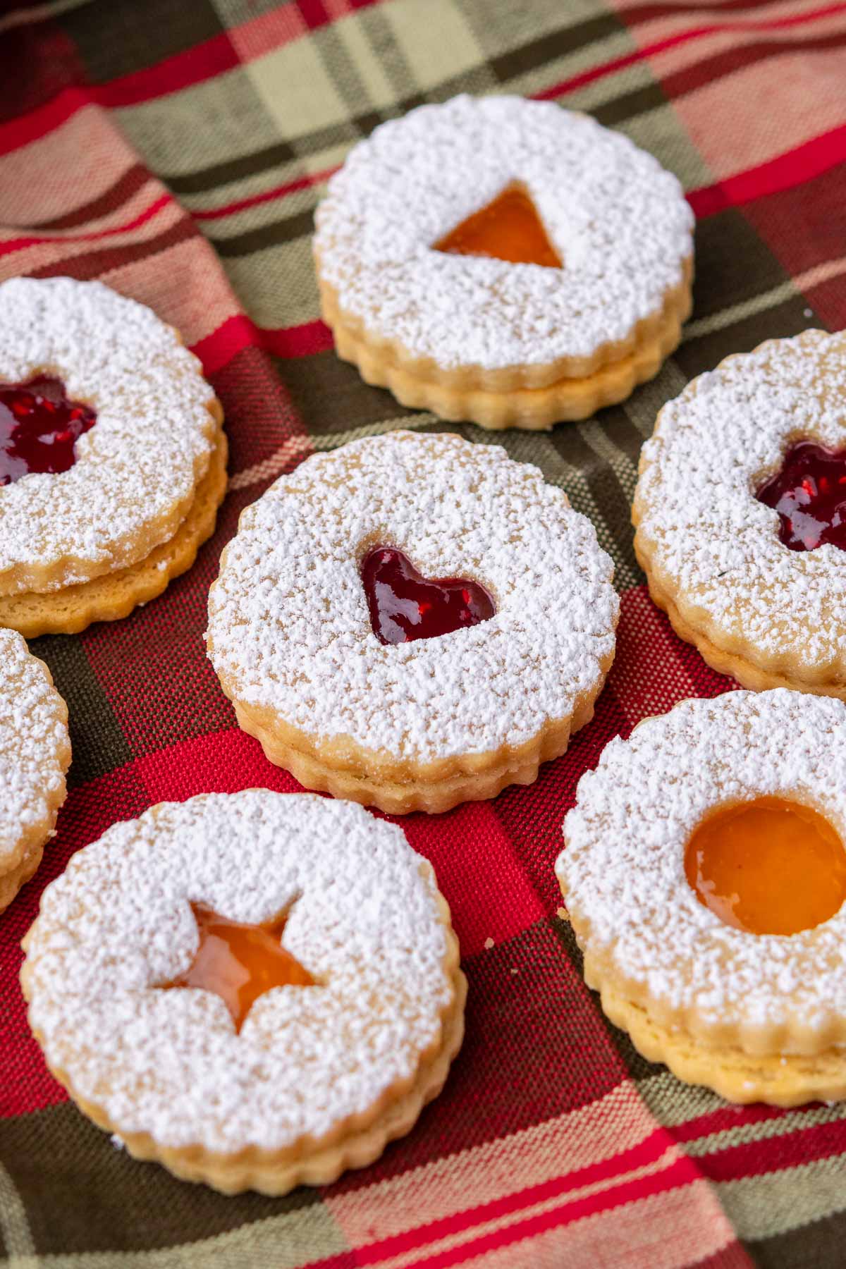 Sourdough linzer cookies on a plaid towel.