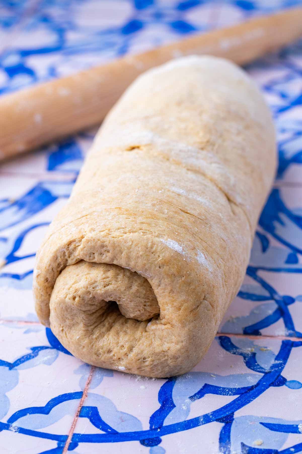 Shaped einkorn sourdough sandwich bread in log.