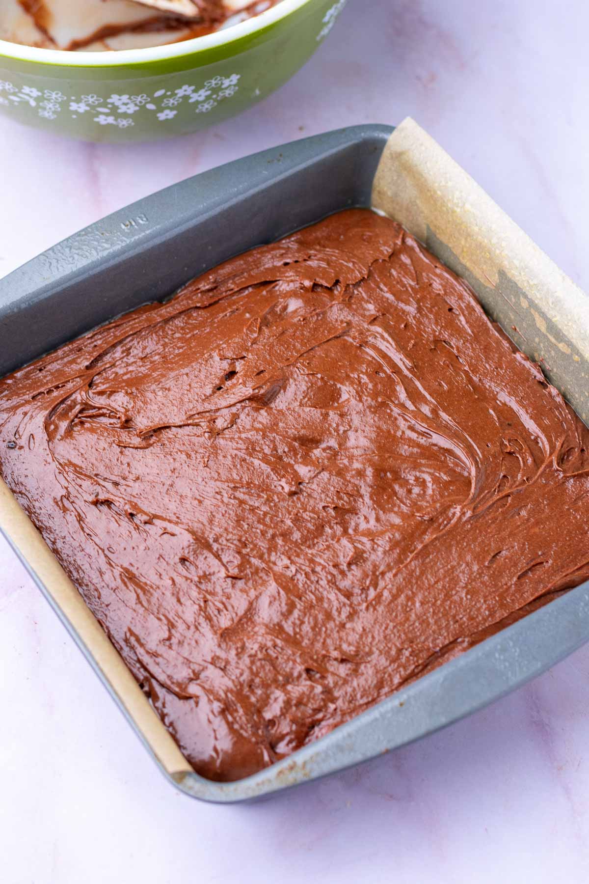 Sourdough brownie batter in baking pan before baking.
