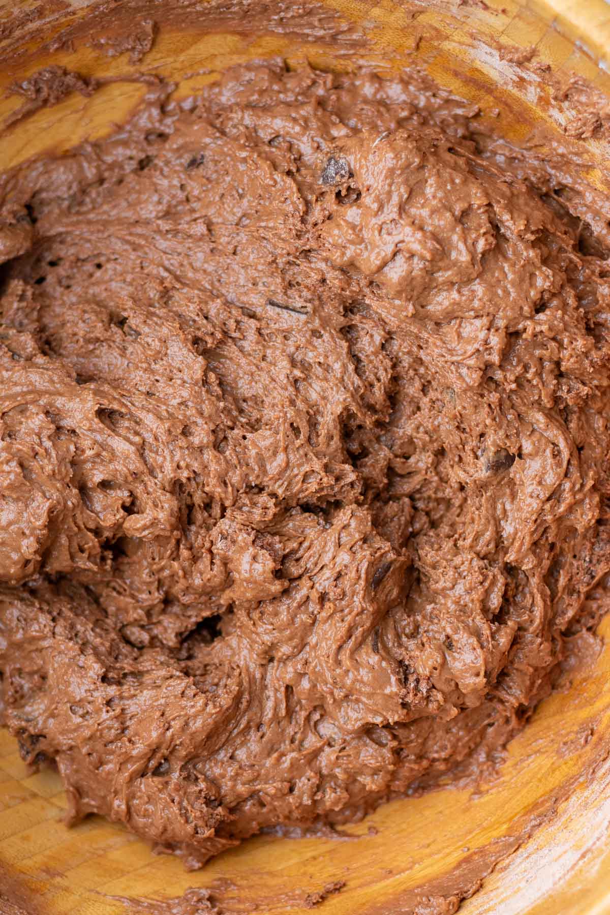 Mixed sourdough chocolate muffin batter in a large bowl.