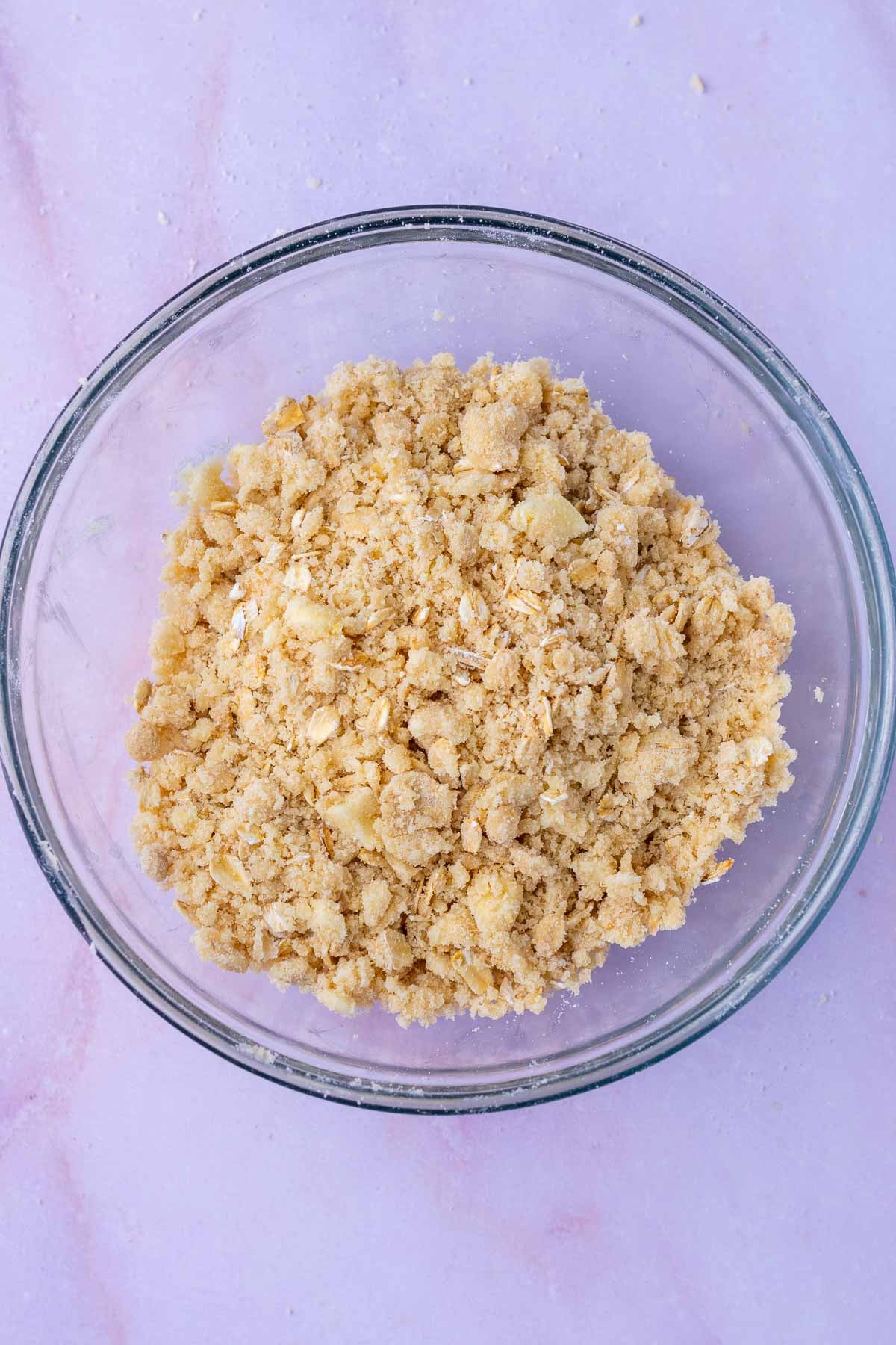 Oat crumble topping mixed in a bowl.