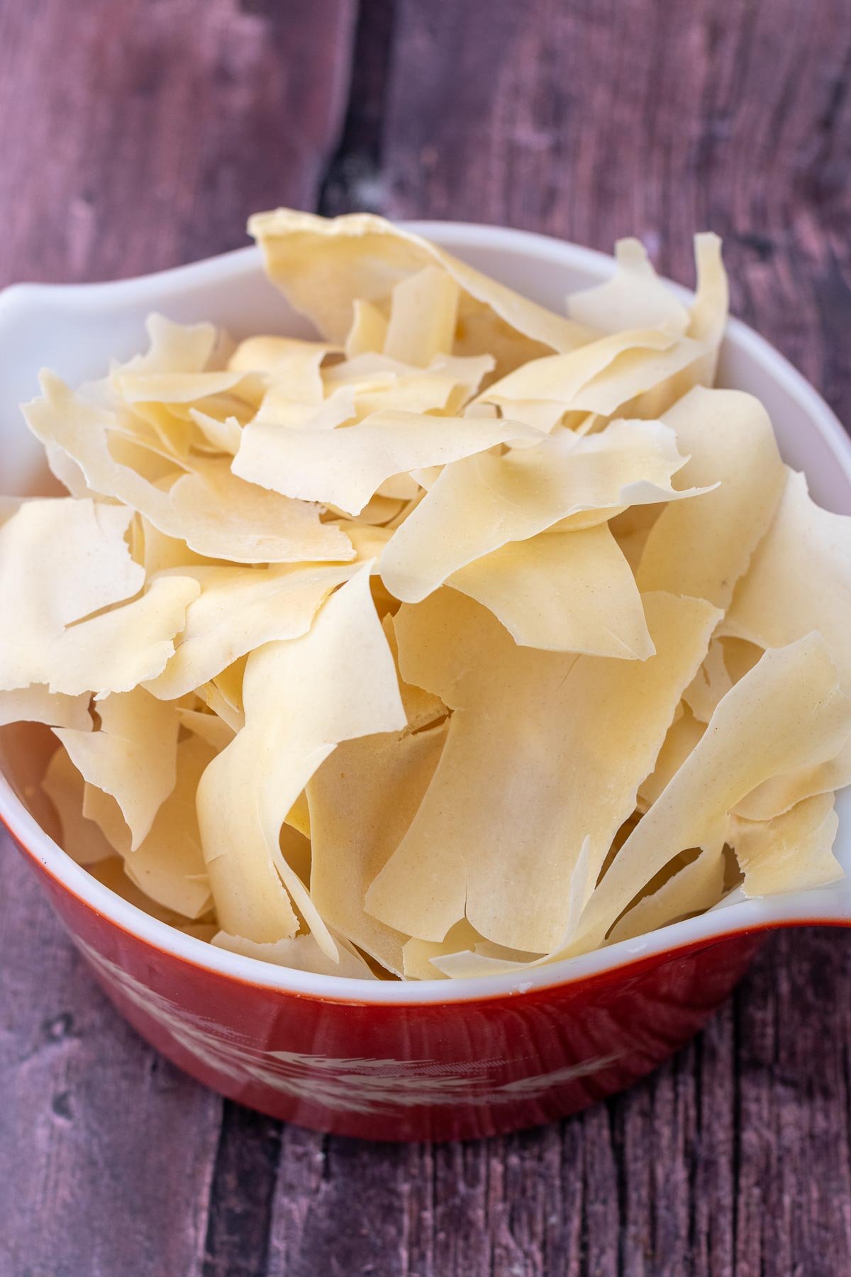 Bowl of dried sourdough starter flakes.