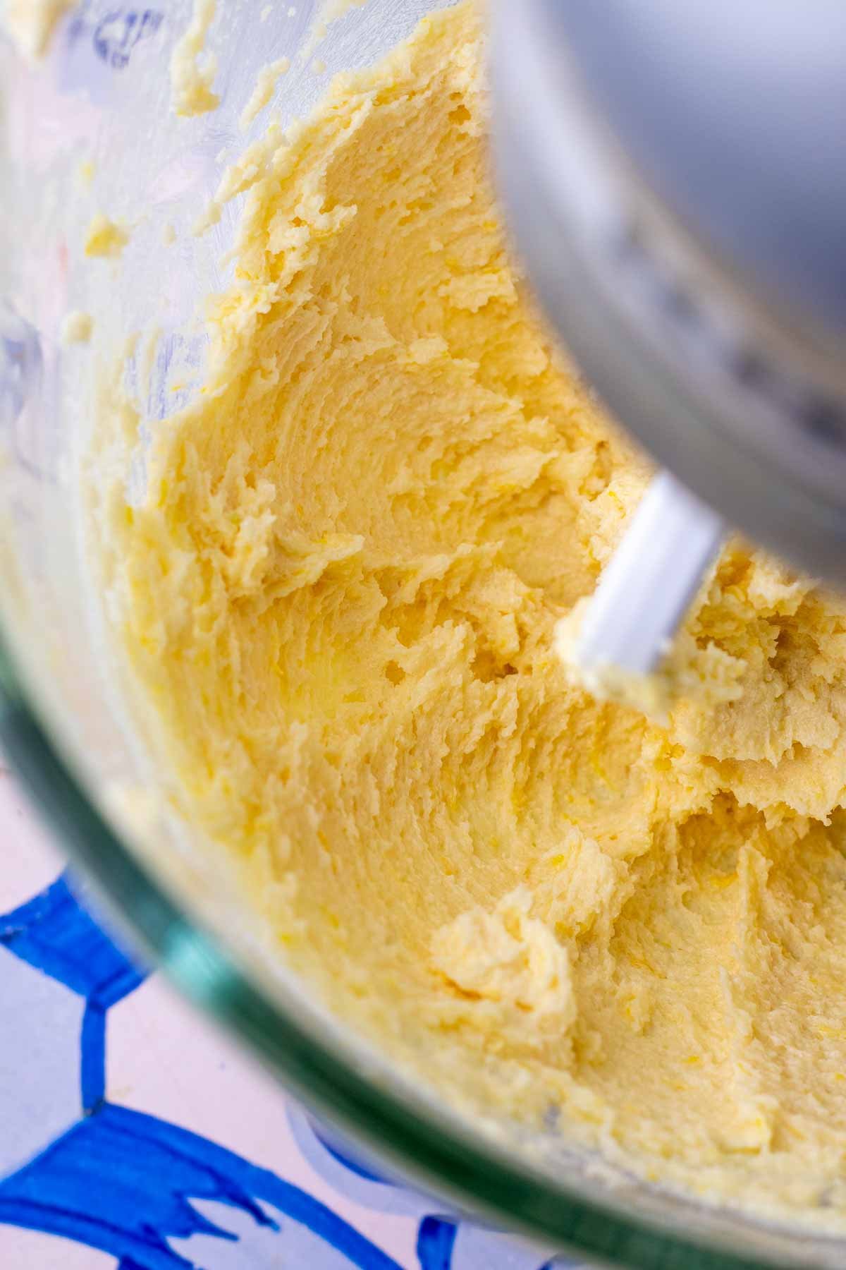 Creaming butter and sugar together in a stand mixer.