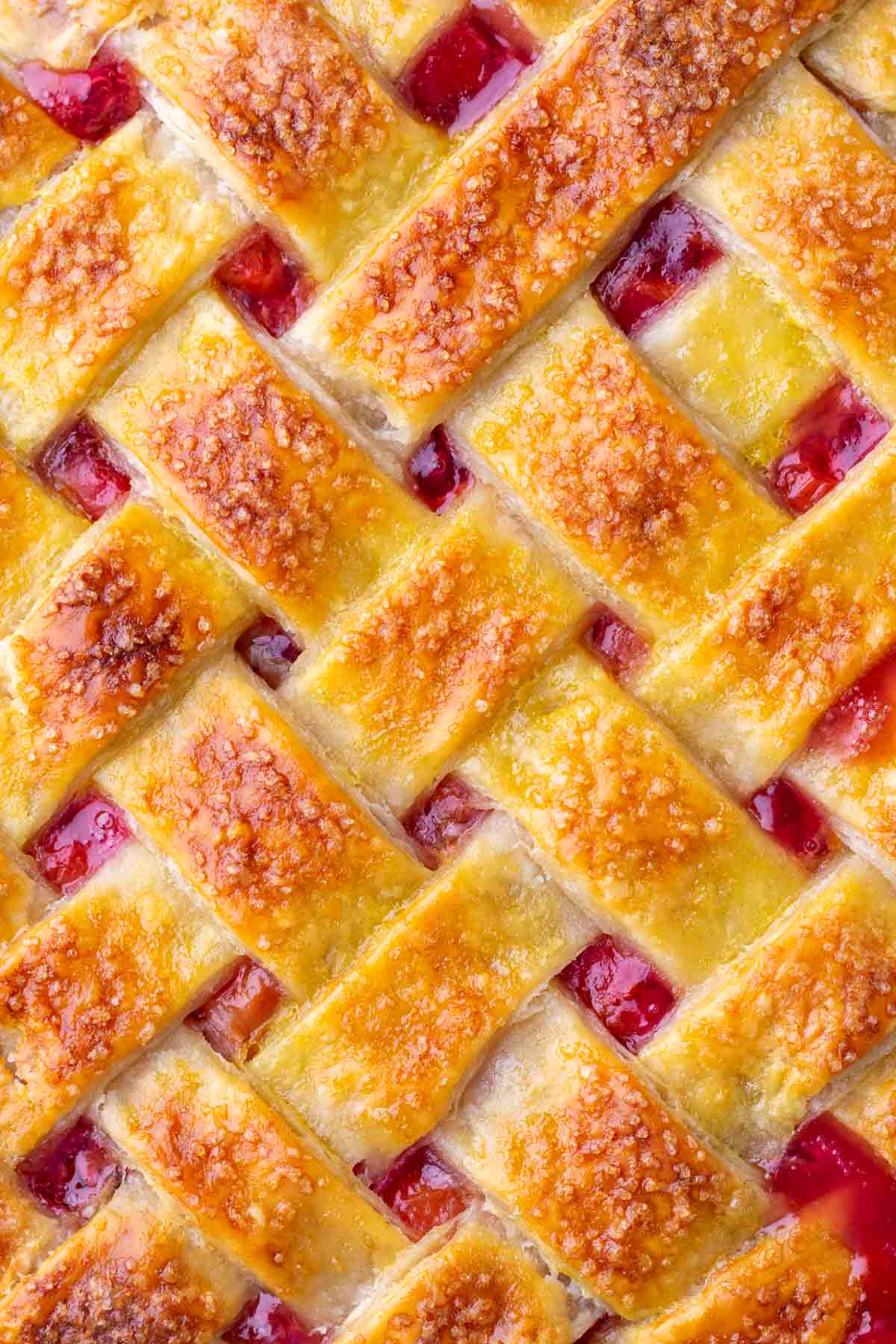 Detailed lattice on sourdough sour cherry pie.