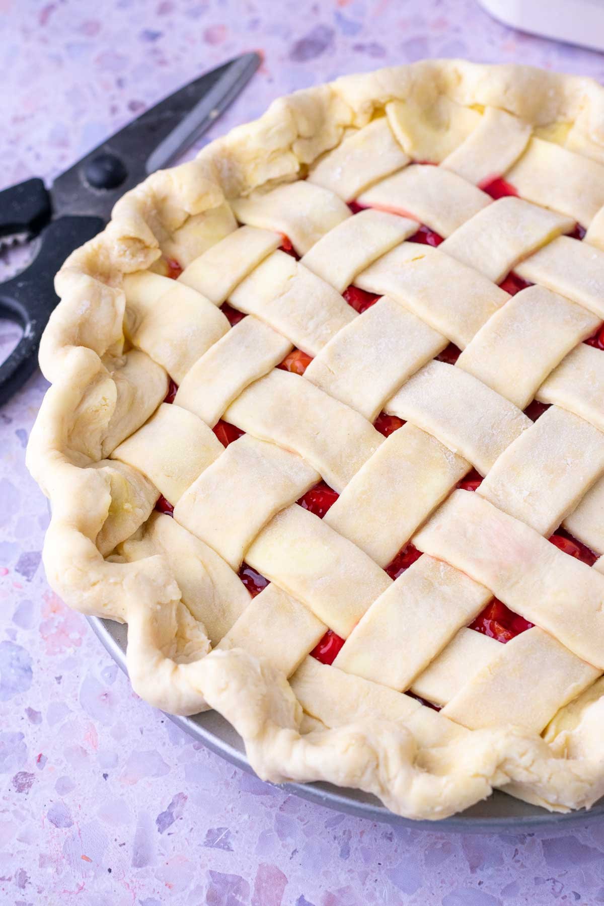 Woven lattice sourdough sour cherry pie.