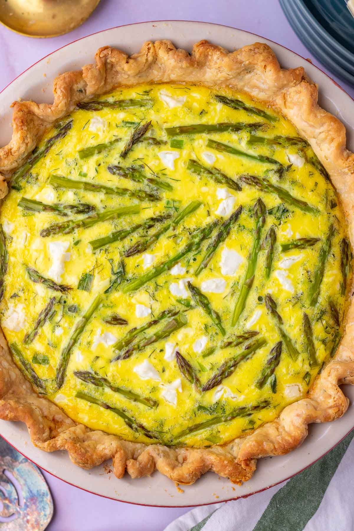 asparagus goat cheese sourdough quiche in a pie pan