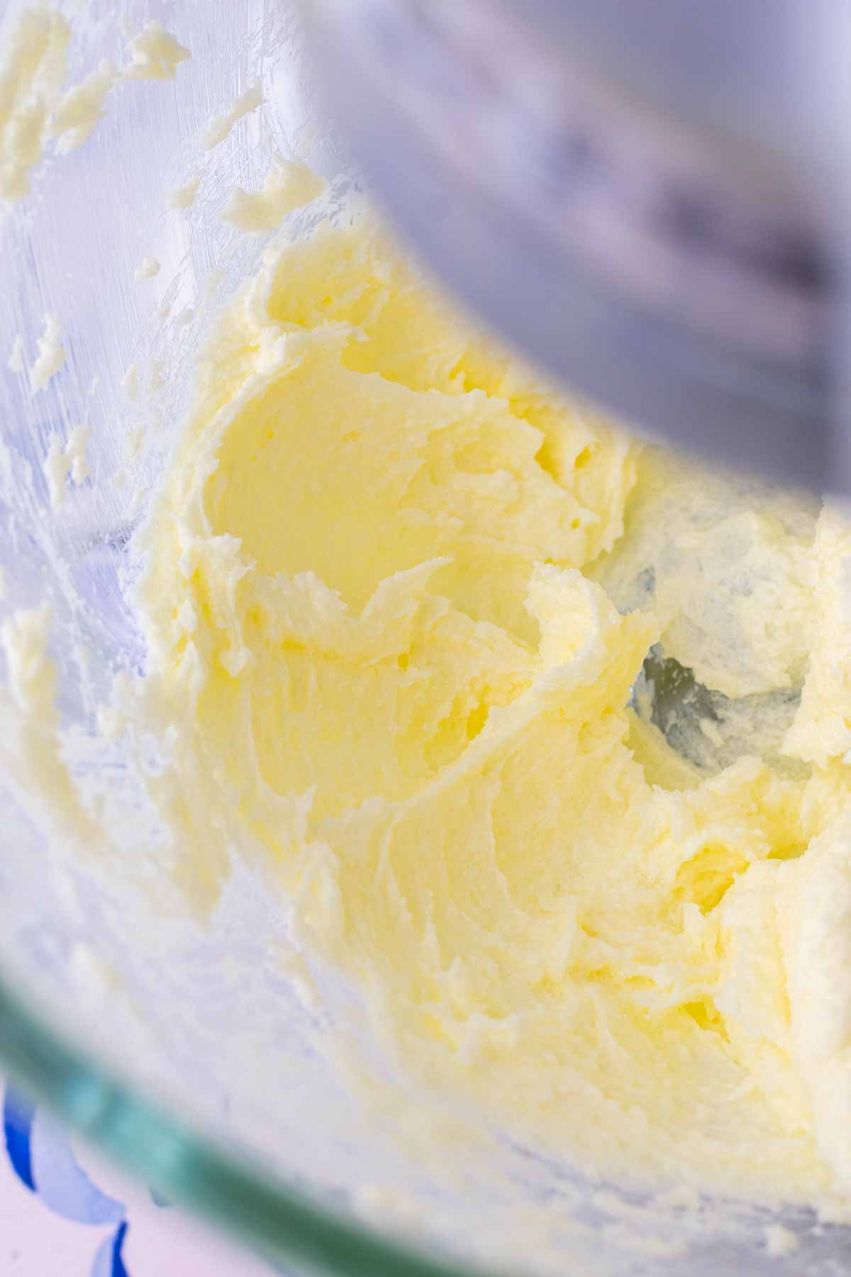 Creaming butter and sugar together in a stand mixer.