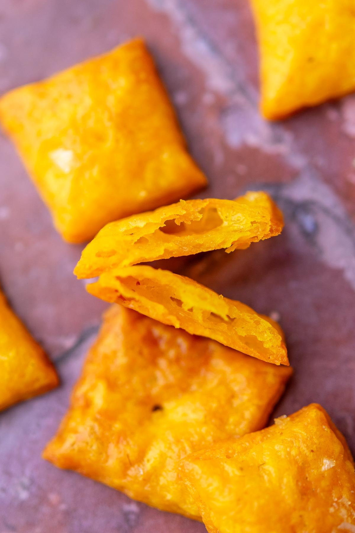 Close up of crispy interior of sourdough discard cheese crackers.