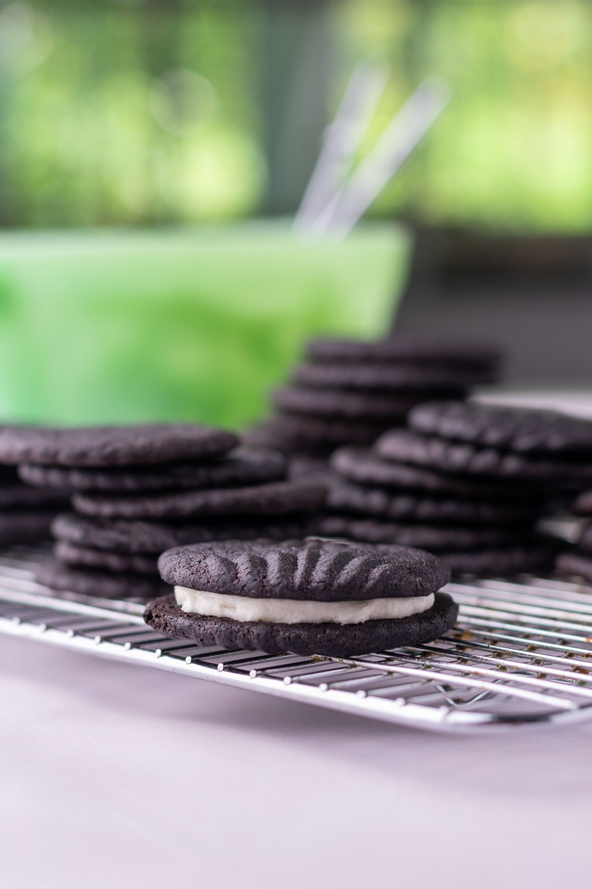 Sourdough oreos on a wire rack.