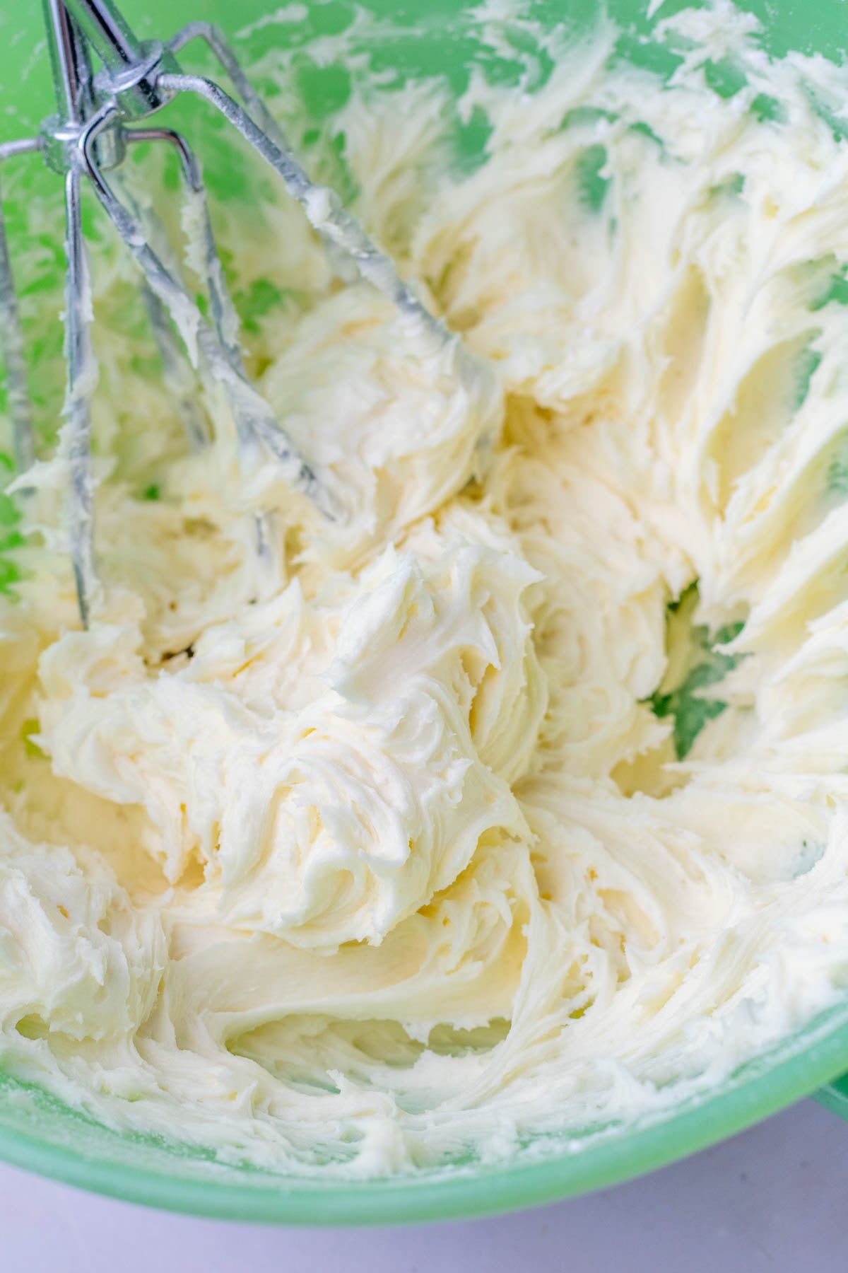 Vanilla buttercram for oreo filling mixed in bowl.