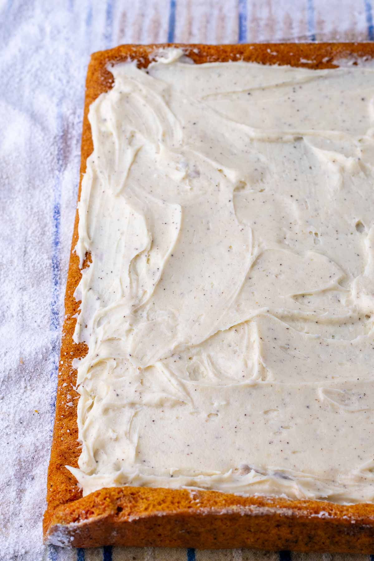 Brown butter cream cheese spread on sourdough pumpkin roll before rolling.