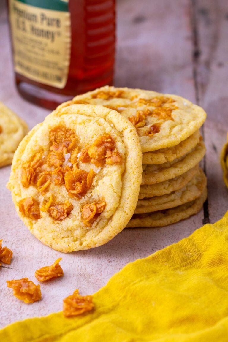 Stack of sourdough corn cookies with caramelized honey cornflakes.