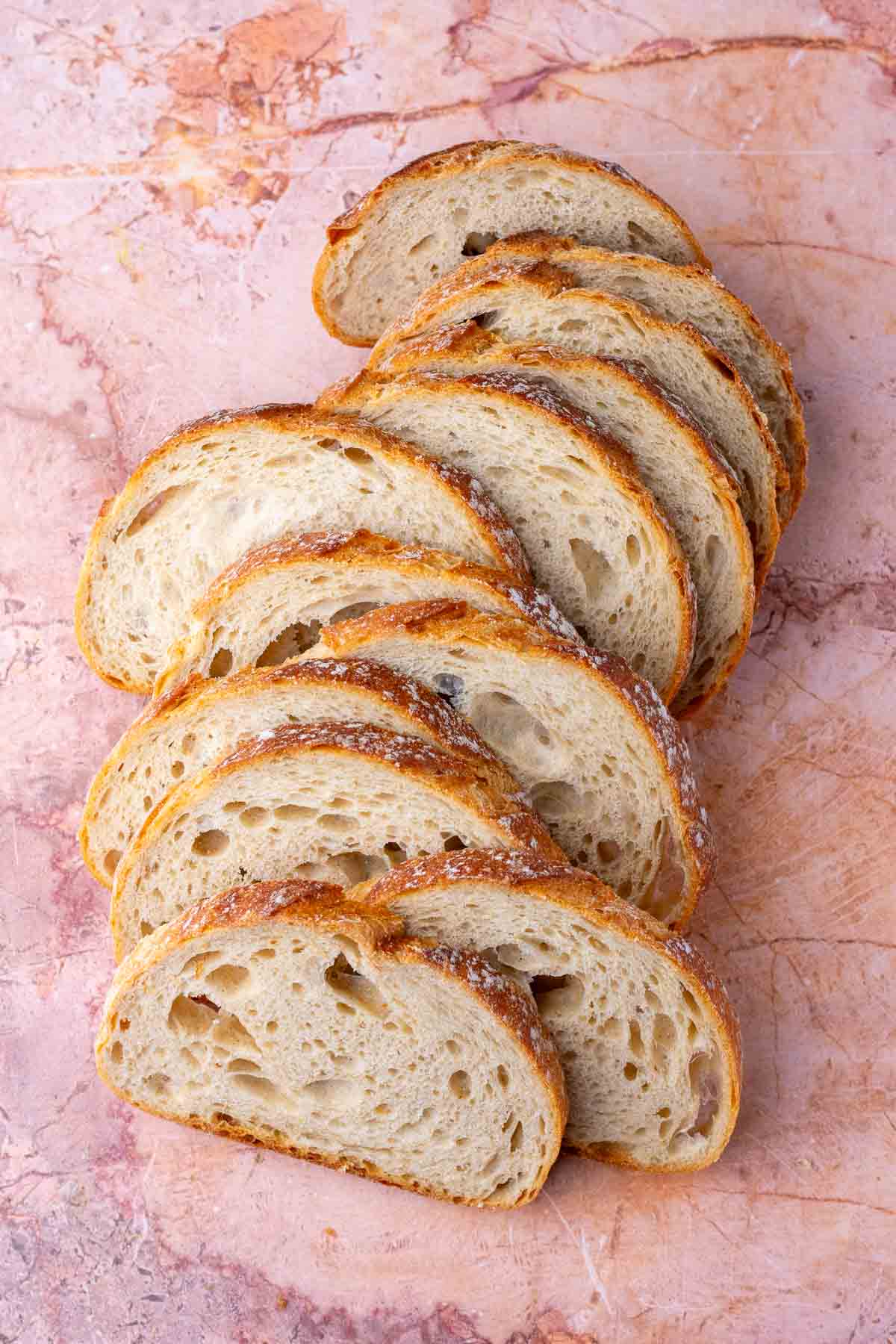 Slices of sourdough bread spread out.