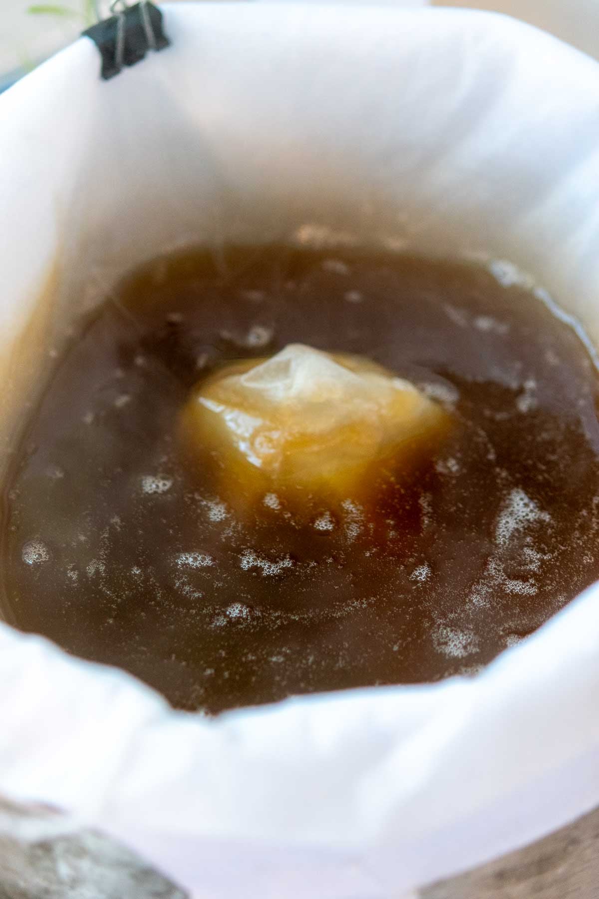 Filtering maple syrup.