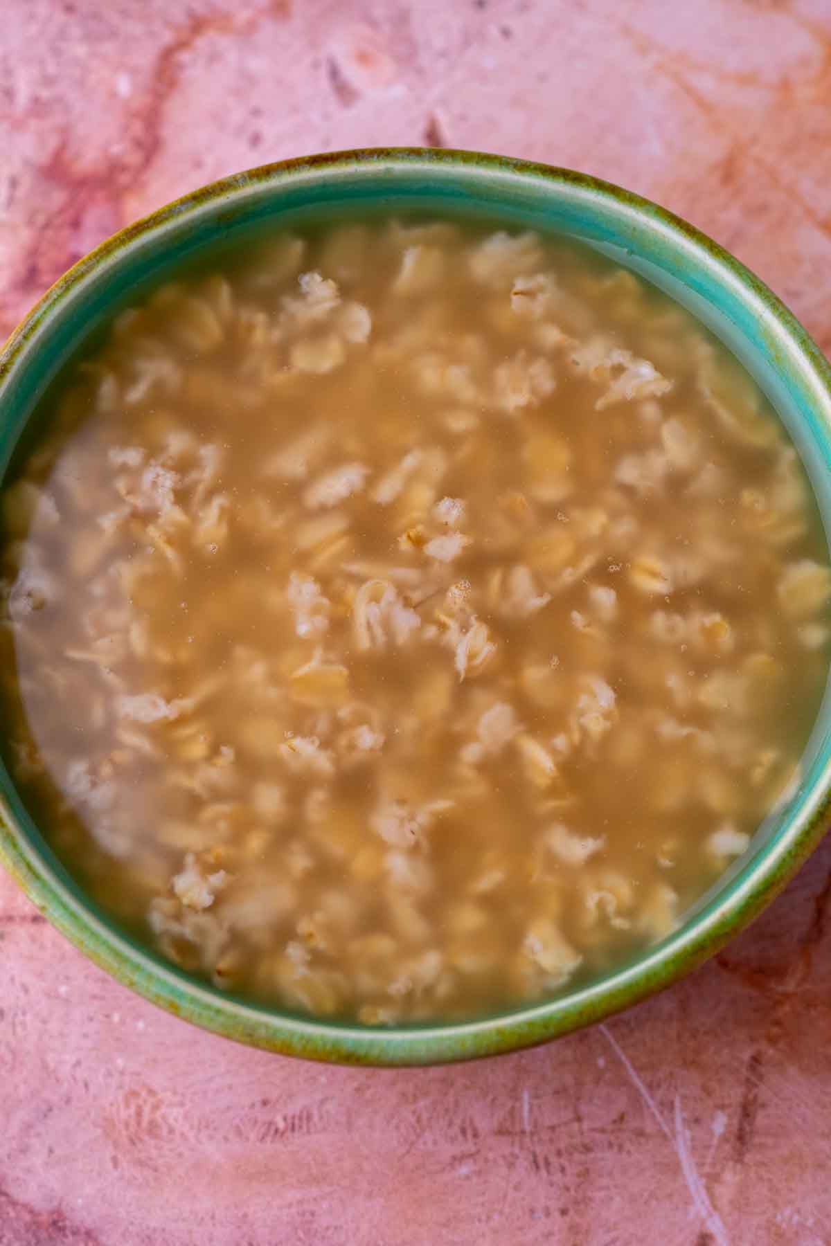Bowl of maple oat porridge oatmeal.