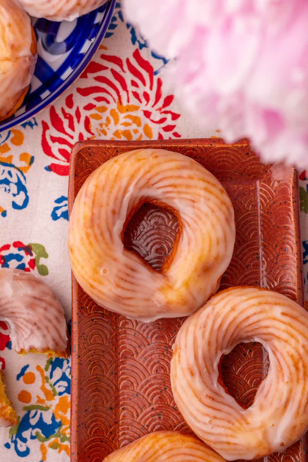 Close up of sourdough crullers on a plate.