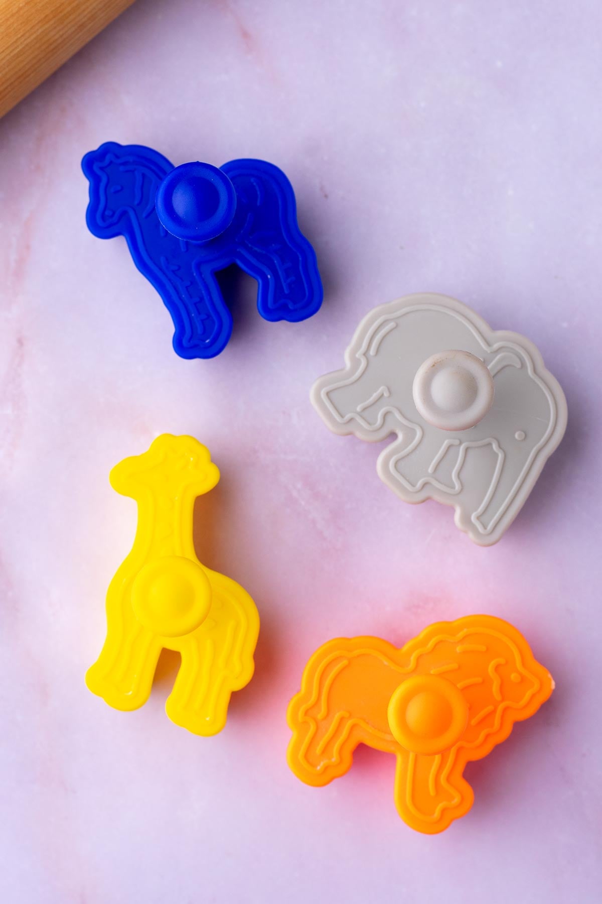Colorful animal cracker cookie cut outs.