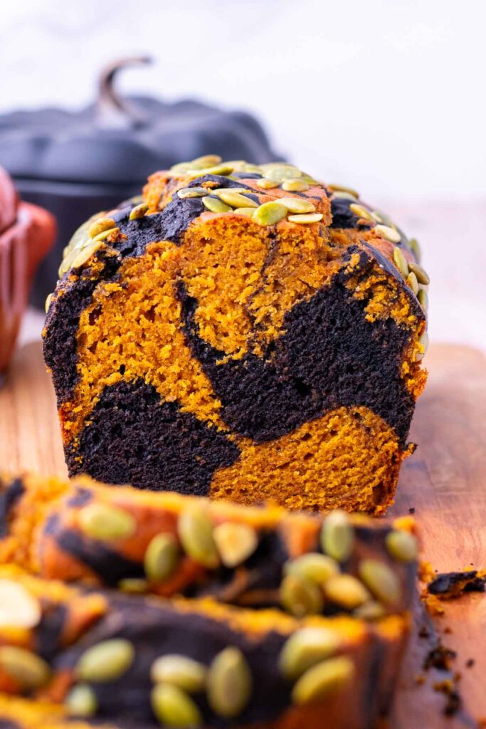 Interior slice of sourdough pumpkin marble bread.
